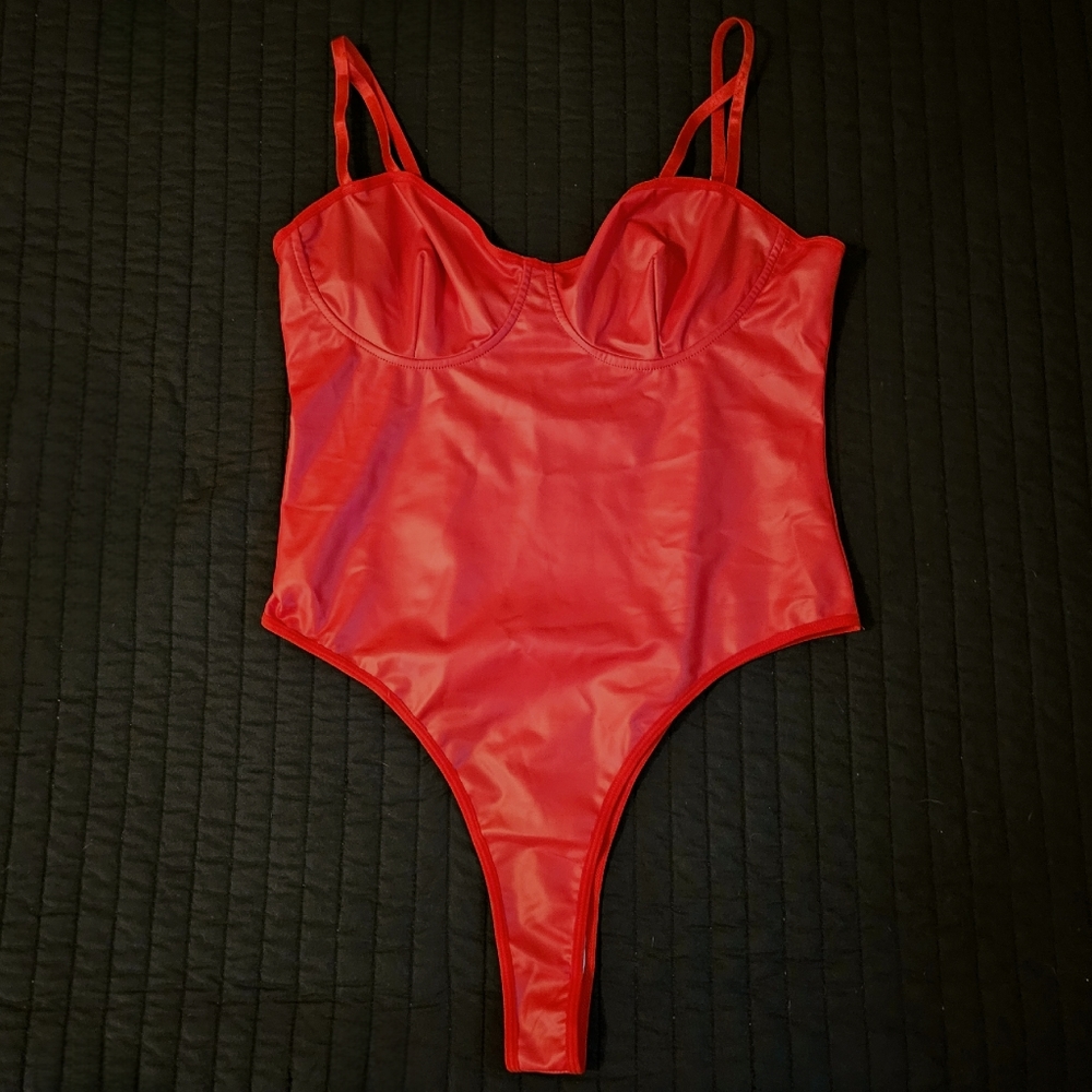 Sexy, red, vinyl bodysuit